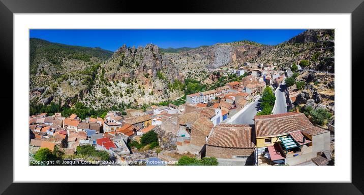 Panoramic of the Spanish city of Ayna, in La Mancha, seen from above, famous for its orchards next to the Jucar river. Framed Mounted Print by Joaquin Corbalan
