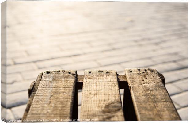 Image with a box aged wooden planks with blur background with copy space. Canvas Print by Joaquin Corbalan