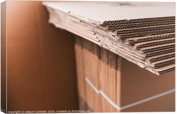 New unused cardboard boxes made from recycled material. Canvas Print by Joaquin Corbalan