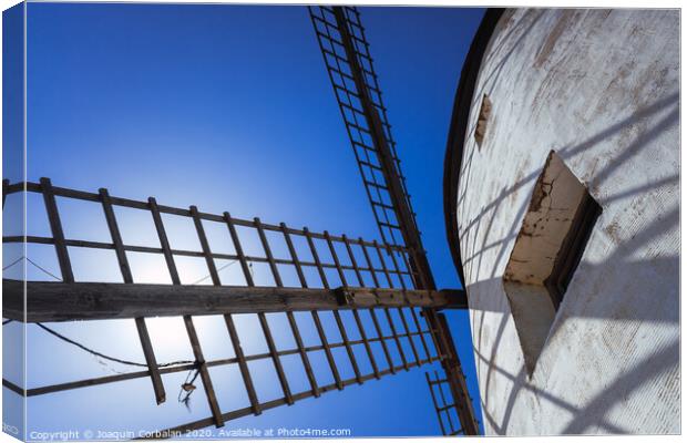 Traditional windmill of La Mancha, in Spain, protagonist of the famous novel Don Quixote. Canvas Print by Joaquin Corbalan