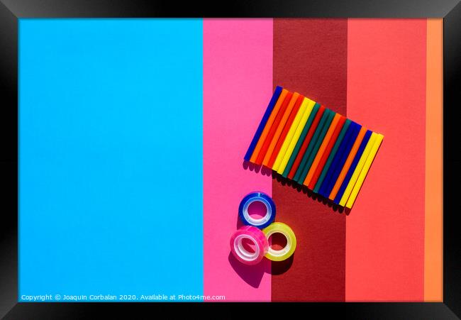 Colored background seen from above with plastic bars to use in crafts and stationery. Framed Print by Joaquin Corbalan