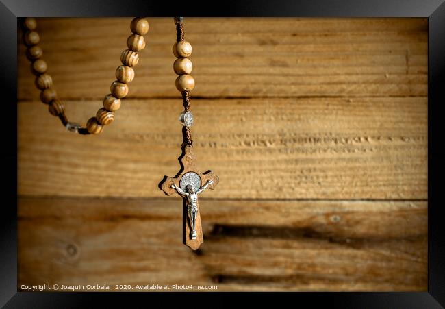 Rosary with wooden beads and Christian cross. Framed Print by Joaquin Corbalan