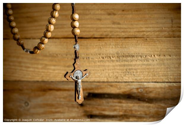 Rosary with wooden beads and Christian cross. Print by Joaquin Corbalan