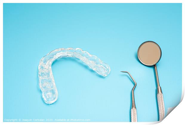 Dentist material to treat bruxism with dental splints, isolating on medical background Print by Joaquin Corbalan