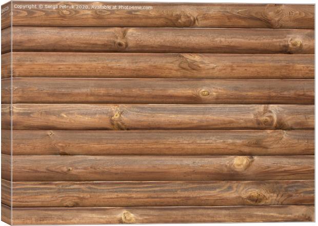 Brown log wooden wall texture Canvas Print by Sergii Petruk