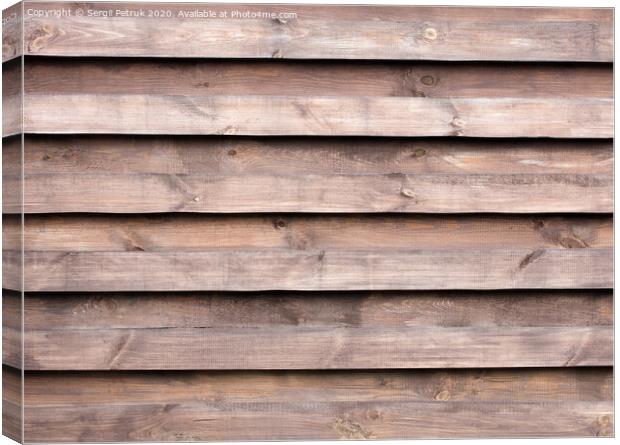 Texture of a wooden fence with a new horizontal brown background Canvas Print by Sergii Petruk