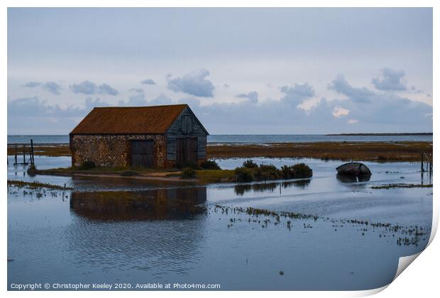 North Norfolk coal barn surrounded by sea Print by Christopher Keeley