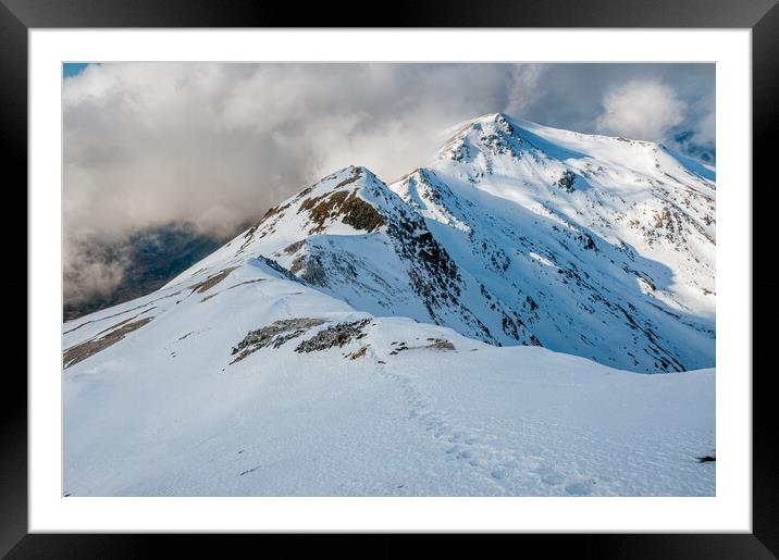Foot prints in the snow in Glen Shiel Framed Mounted Print by George Robertson