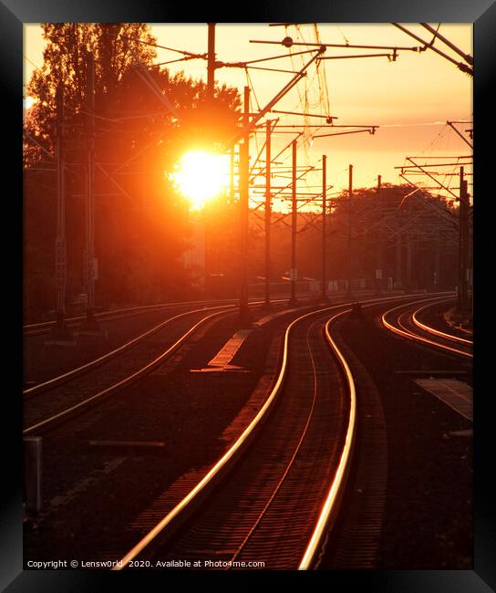 Sunset reflected on train tracks Framed Print by Lensw0rld 