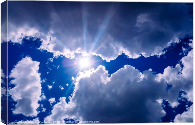 Uva and uvb rays of the sun pass through the atmosphere and the clouds to the skin of people. Canvas Print by Joaquin Corbalan