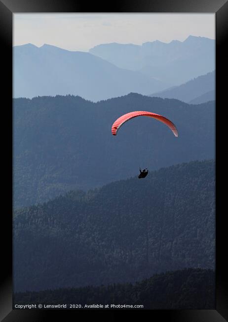 Paraglider in front of a mountain panorama Framed Print by Lensw0rld 