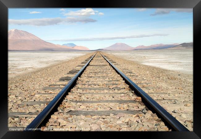 Rail tracks in Salar de Uyuni, Bolivia Framed Print by Lensw0rld 