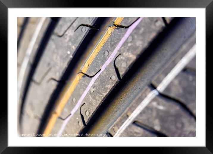 Detail of the grooves of a new car tire. Framed Mounted Print by Joaquin Corbalan