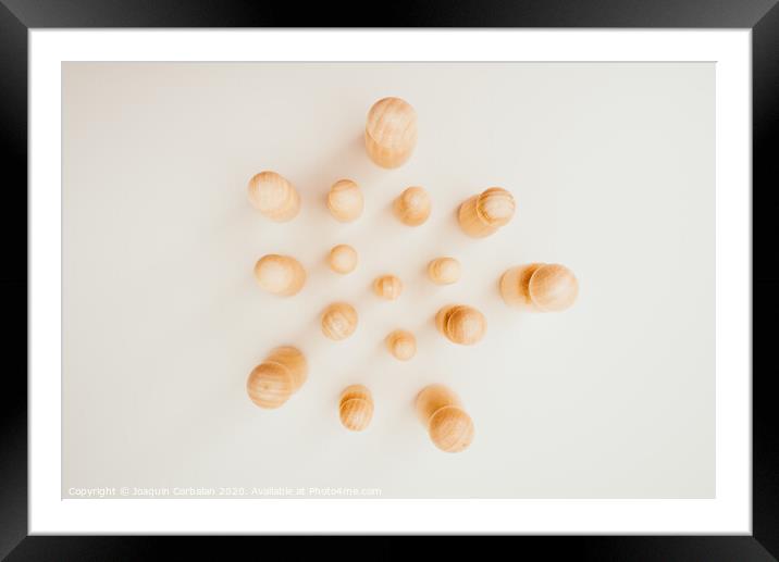 Figures in solitude isolated from other people, minimalist, seen from above. Framed Mounted Print by Joaquin Corbalan