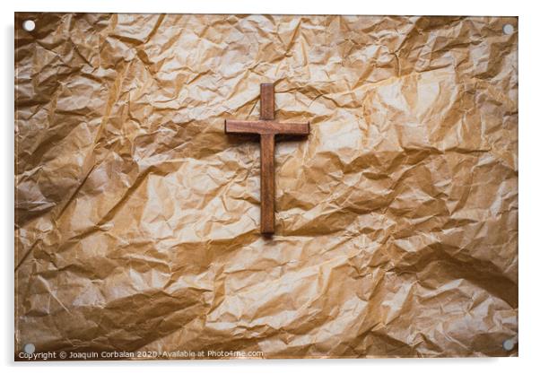 Simple wooden religious cross on brown paper background. Acrylic by Joaquin Corbalan