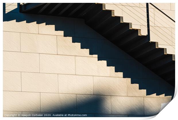 Minimalist wall with shadows from the upper steps of a modern stone staircase. Print by Joaquin Corbalan