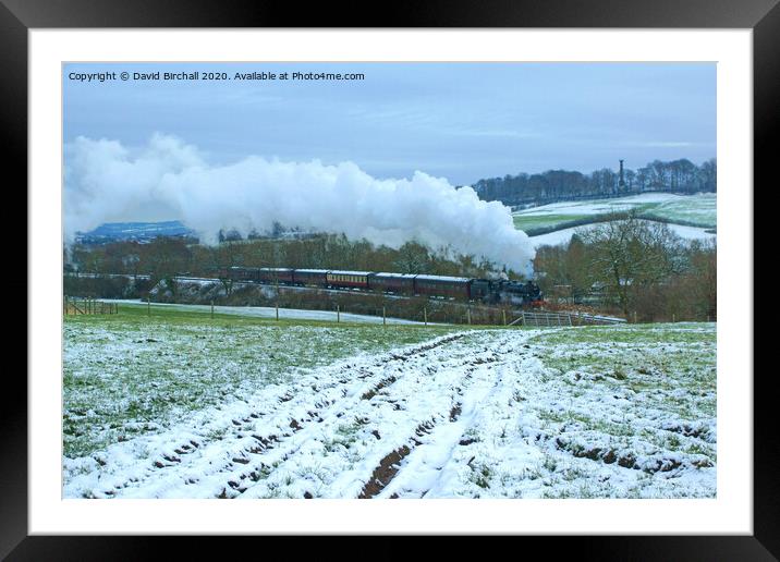 Steam train 73129 in snowy landscape. Framed Mounted Print by David Birchall