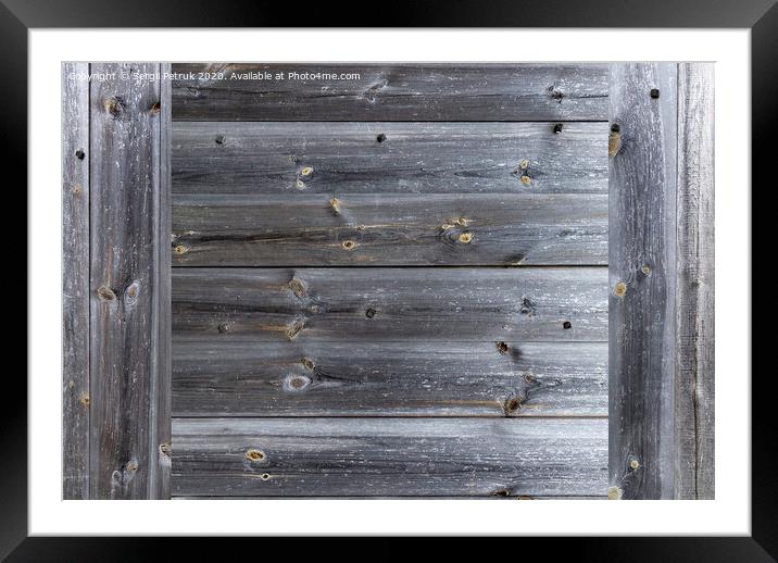 A frame of a seasoned old gray wooden fence closeup Framed Mounted Print by Sergii Petruk