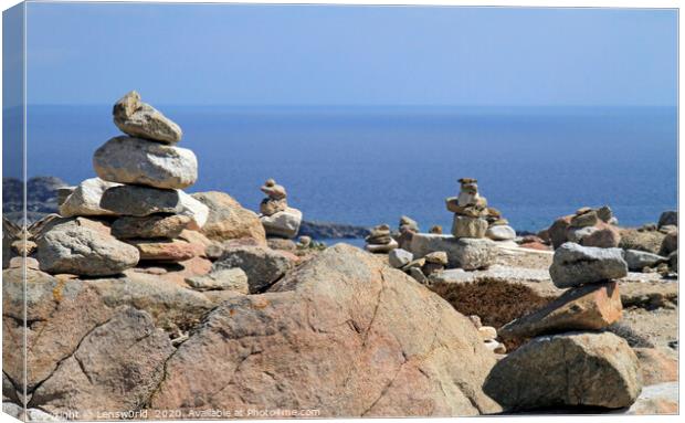 Stacked rocks at the coast of Mykonos Canvas Print by Lensw0rld 