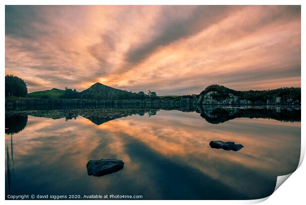 Cawfields Quarry rising sun fire Print by david siggens