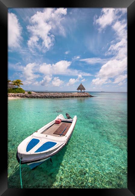 Boat in the shallow tropical lagoon Framed Print by Jenny Rainbow