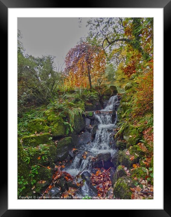 A large waterfall in a forest Framed Mounted Print by carl blake