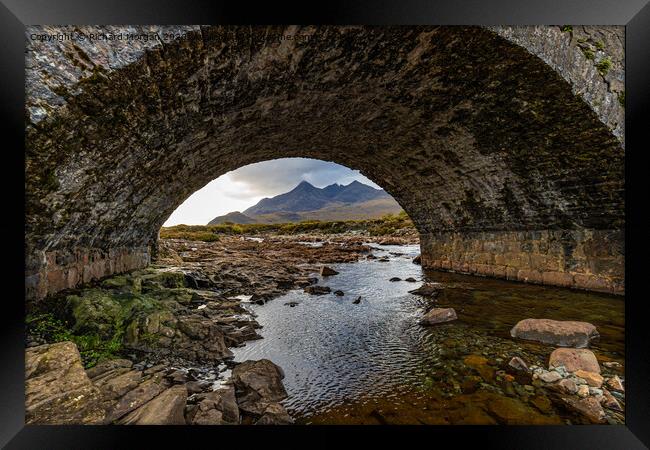 Cuillin Mountains under the arch.  Framed Print by Richard Morgan