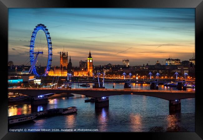 Beautiful landscape image of the London skyline at night looking along the River Thames Framed Print by Matthew Gibson
