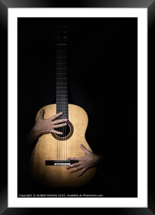 Female hands on guitar. Framed Mounted Print by RUBEN RAMOS
