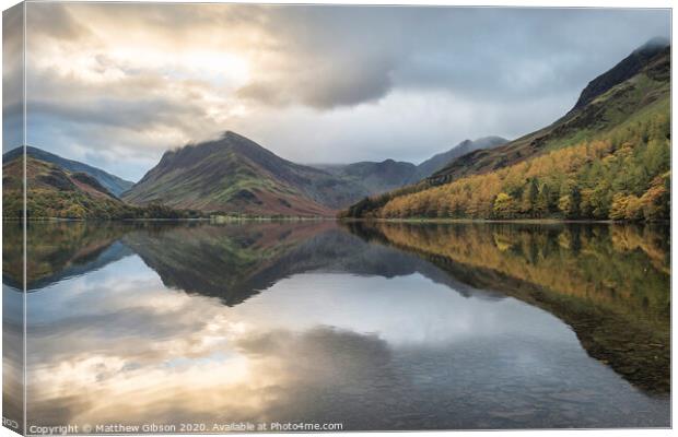 Beautiful Autumn Fall landscape image of Lake Buttermere in Lake District England  Canvas Print by Matthew Gibson