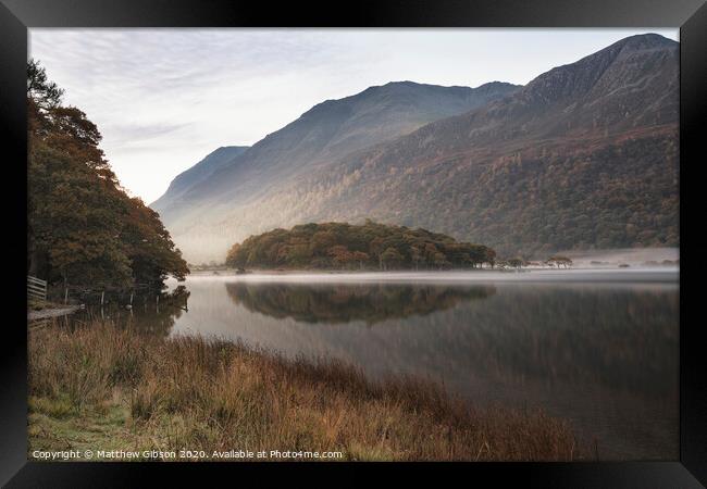 Beautiful Autumn Fall landscape image of Crummock Water at sunrise in Lake District England Framed Print by Matthew Gibson
