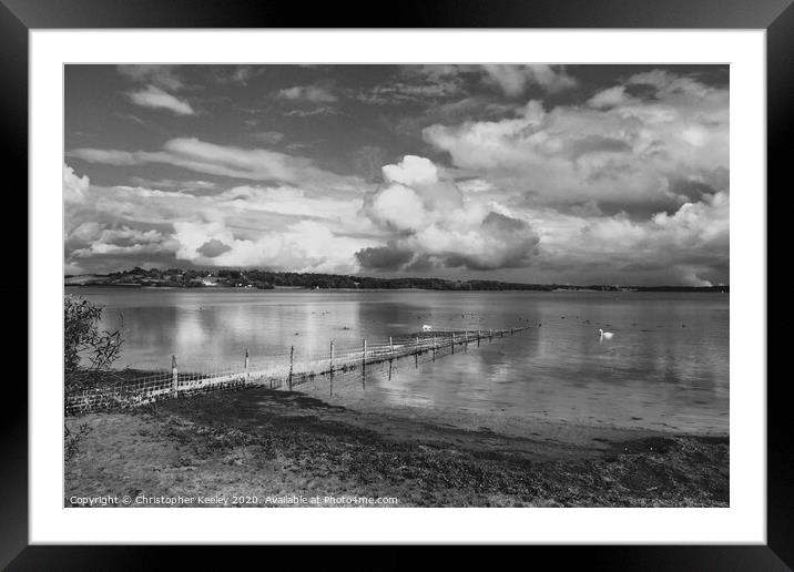 Cloudy skies over Rutland Water Framed Mounted Print by Christopher Keeley