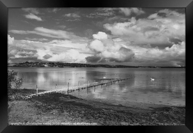 Cloudy skies over Rutland Water Framed Print by Christopher Keeley