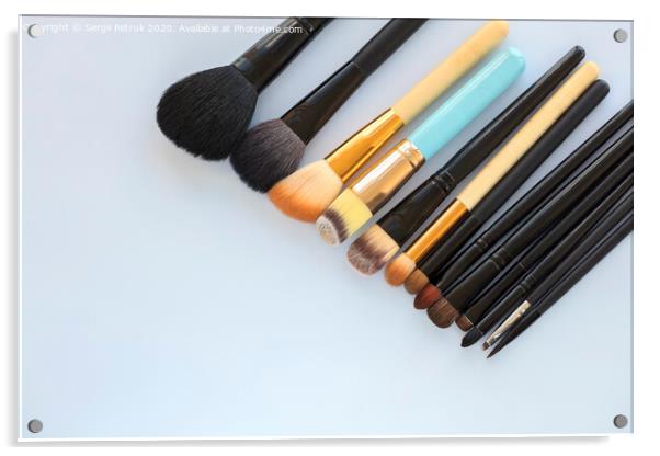 set of various professional cosmetic makeup brushes on a light background close-up Acrylic by Sergii Petruk