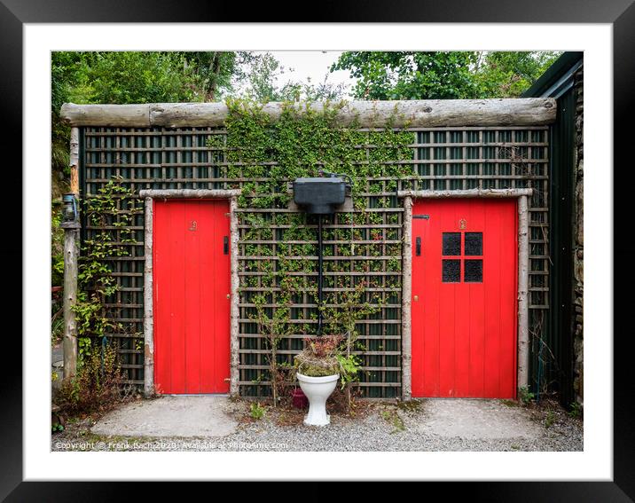 Rustic toilet buliding in a rural countryside Framed Mounted Print by Frank Bach