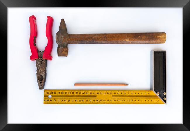Hammer with wooden handle, pliers, square and pencil isolated on light background closeup Framed Print by Sergii Petruk