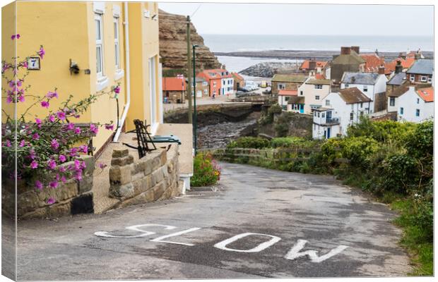 Steep road leading into Staithes Canvas Print by Jason Wells