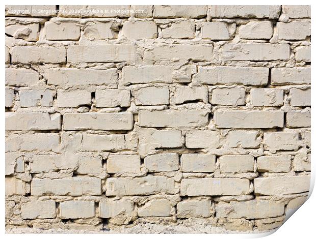 Very old brick wall painted with light beige paint. Print by Sergii Petruk