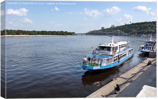 Pleasure boat moored at the city wharf of the Dnipro River Canvas Print by Sergii Petruk