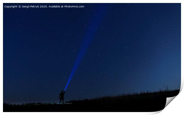 Silhouette of man on a background of stars..Man desires guess looking at the stars. Print by Sergii Petruk