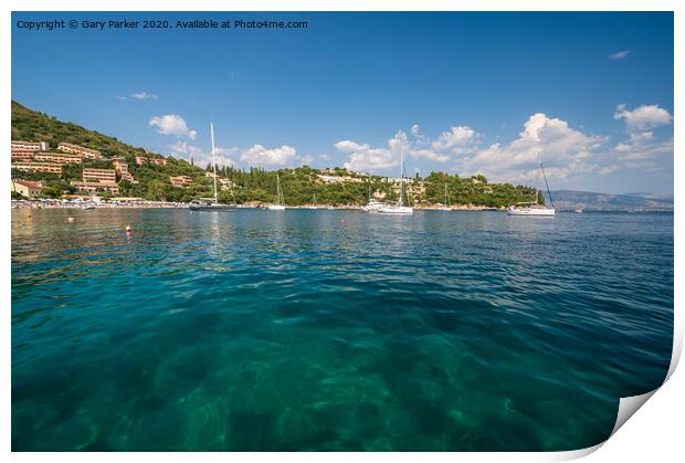 The clear waters of Kalami Bay, in Corfu, Greece, on a bright summers day	 Print by Gary Parker