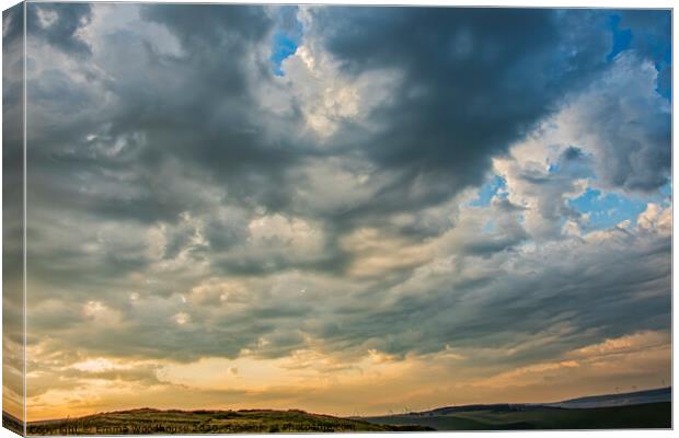 Stormy Clouds Canvas Print by Emma Woodhouse