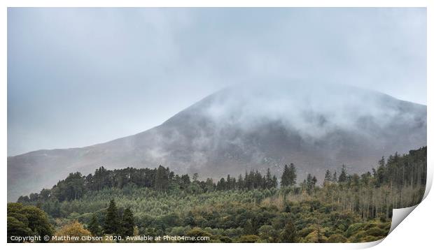 Stunning landscape image of Derwentwater in English Lake District during late Summer with still water and misty mountains in the distance Print by Matthew Gibson