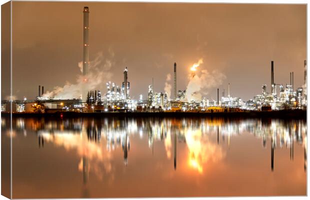 Refineries reflection and its chimney during the on fire sunset golden hour moment at Rotterdam, Netherlands Canvas Print by Ankor Light