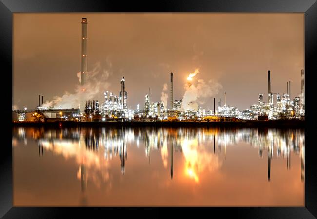 Refineries reflection and its chimney during the on fire sunset golden hour moment at Rotterdam, Netherlands Framed Print by Ankor Light