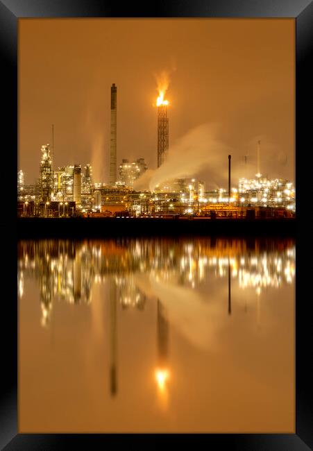 Refineries reflection and its chimney during the on fire sunset golden hour moment at Rotterdam, Netherlands Framed Print by Ankor Light