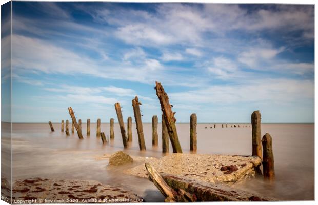 Groynes on the shore Canvas Print by kevin cook