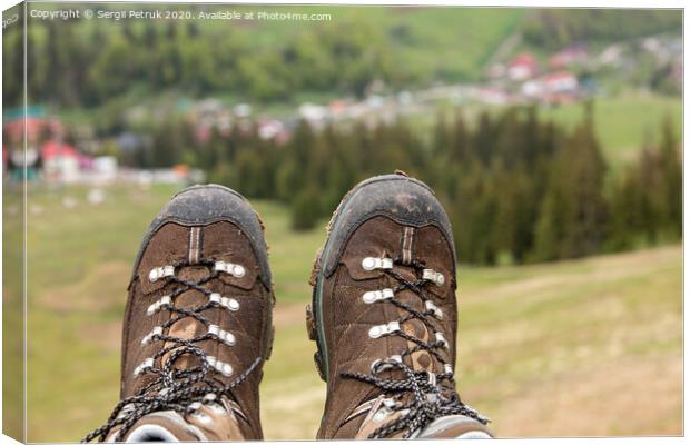 Mountain trekking boots close-up after a long journey through the mountains Canvas Print by Sergii Petruk