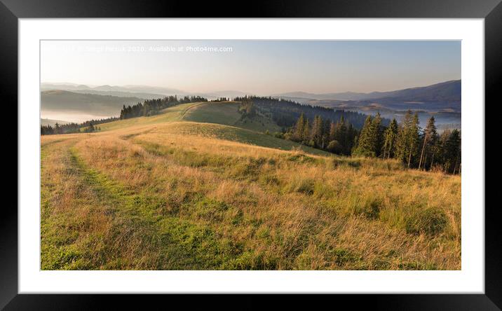 Beautiful scenery of the Carpathian Mountains in the early morning at sunrise and the road passing through the mountain hill Framed Mounted Print by Sergii Petruk