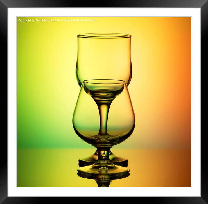 empty glasses on a yellow-green background Framed Mounted Print by Sergii Petruk